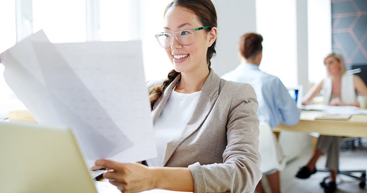 woman-with-paperwork woman-with-paperwork